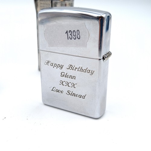 7 - A collection of four flint lock lighters, comprising of modern and vintage design. This includes a v... 