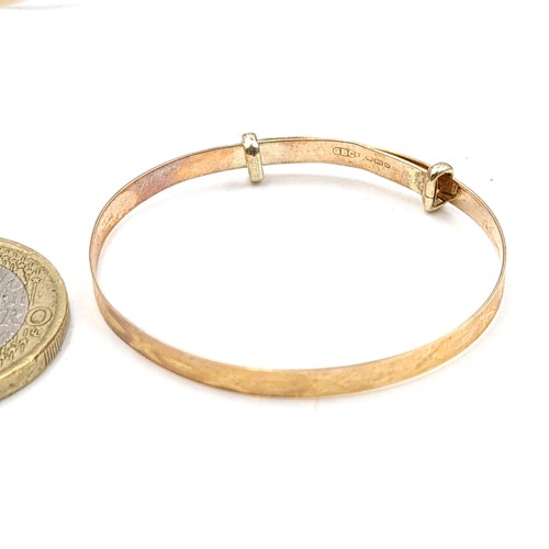 10 - A collection of two vintage children's newborn bracelets, including a stunning 9 carat gold example ... 