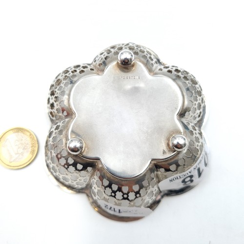 18 - A fine example of an antique sterling silver Bonbon dish, featuring a raised base, scalloped rim and... 