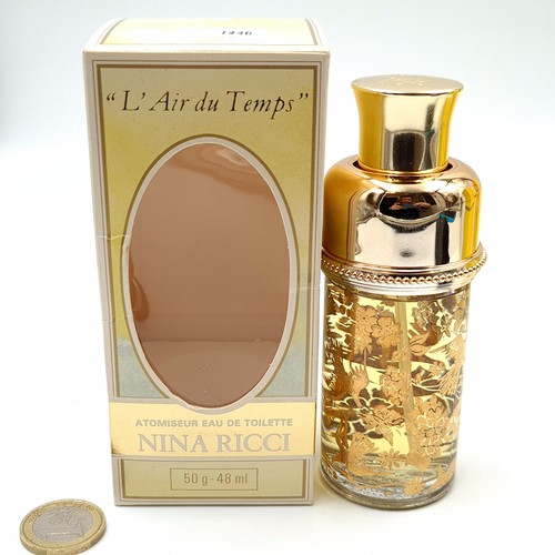 612 - Three Nina Ricci items, consisting of three L'Air du Temps atomiseur eau de perfum (48ml), together ... 