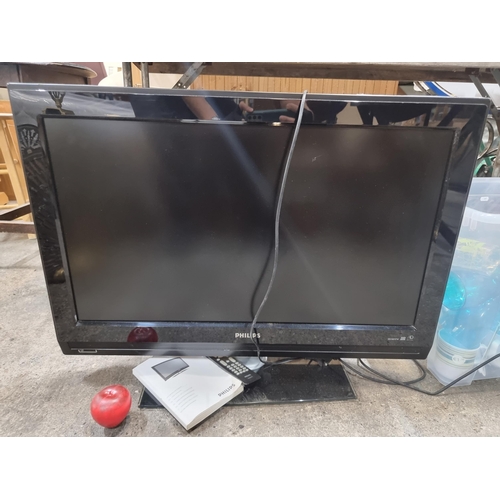 830 - A Fully working large 32'' Philips LCD television. Model 32PFL7332/10. This TV is accompanied by the... 