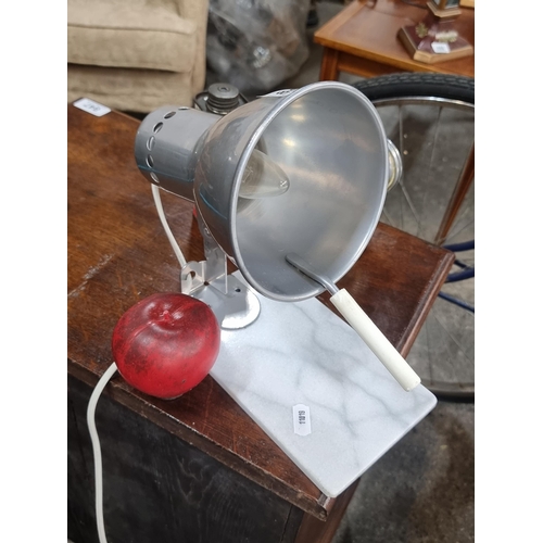 844 - An unusual industrial style desk lamp with conical aluminium shade and a white marble base. With two... 