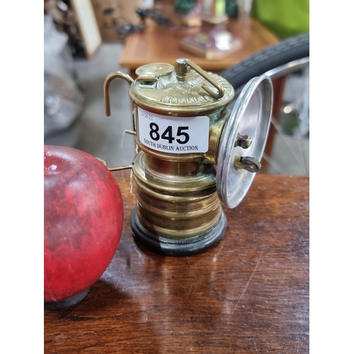 845 - A Premier branded British made carbide miner's head lamp. Circa 1920s. With branding clearly visible... 