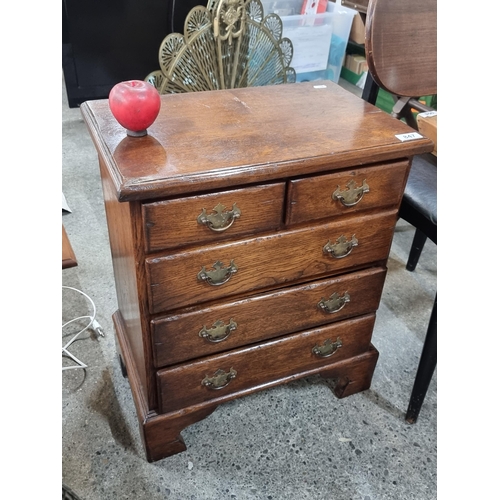 847 - A handsome vintage oak neat size chest or collectors cabinet  of five neat drawers. Featuring brass ... 