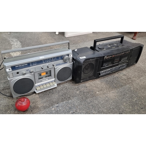 871 - Two vintage radio boomboxes. Including a JVC PCW100 and an Toshiba RT-100S. Both including tape cass... 