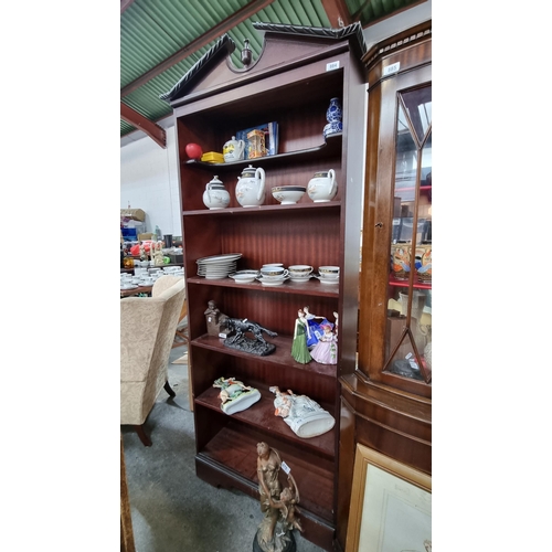 884 - A handsome open  shelving unit with Empire detail to top and five shelves. H200cm x W83cm x D32cm