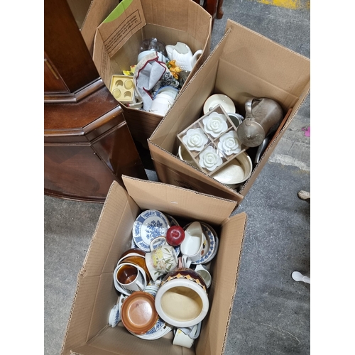 893 - Three boxes containing a large amount of kitchen and homeware items including a Seiko mantle clock, ... 