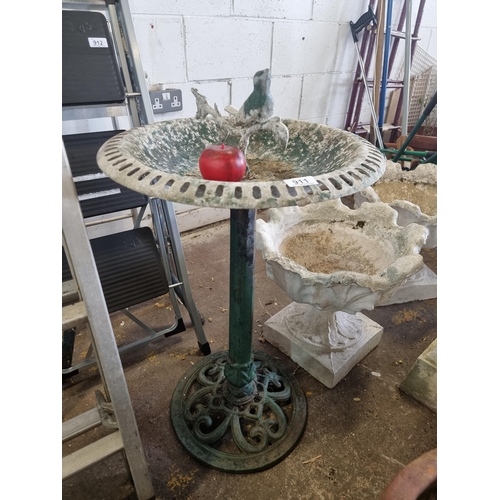 911 - A charming wrought metal bird bath with lovely pierced sides and finial to centre in the form of a b... 