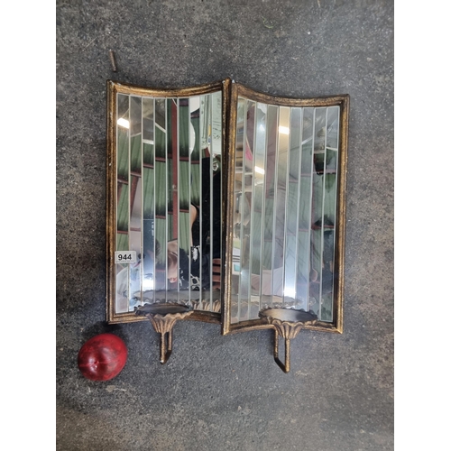 944 - A pair of beautiful convex mirrored wall sconces in the Art Deco style. Featuring a git frame and mi... 