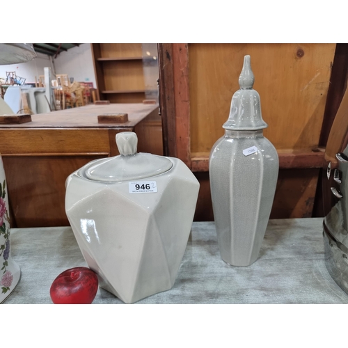 946 - Two large ceramic lidded urns, glazed in shades of cream and grey. Both in great condition.