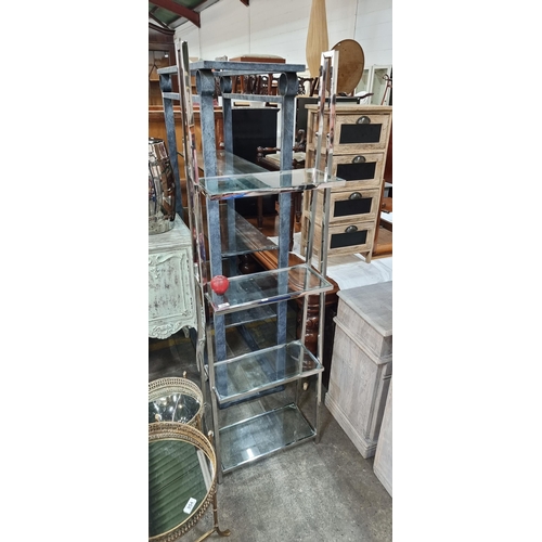 956 - Star lot : A beautiful contemporary high quality  shelving unit. Designed with five gently thick tap... 