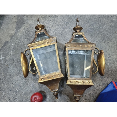 966 - Two elegant Victorian style lantern sconces. Featuring a distressed brass frame with glass panes and... 