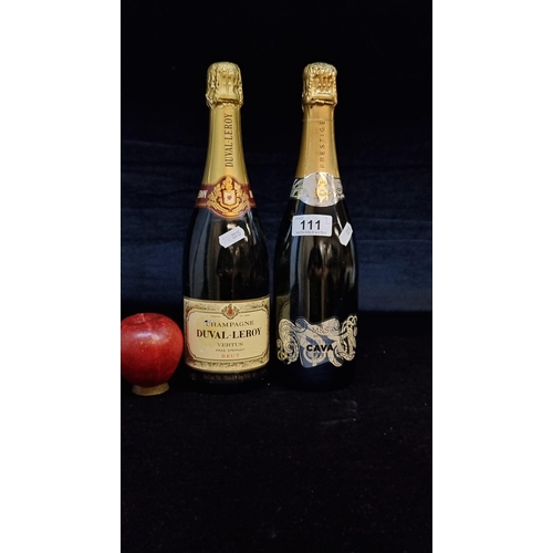 111 - Two sealed 75cl bottles of Champagne Duval - Leroy Vertus Brut and Prestige Cava Brut.