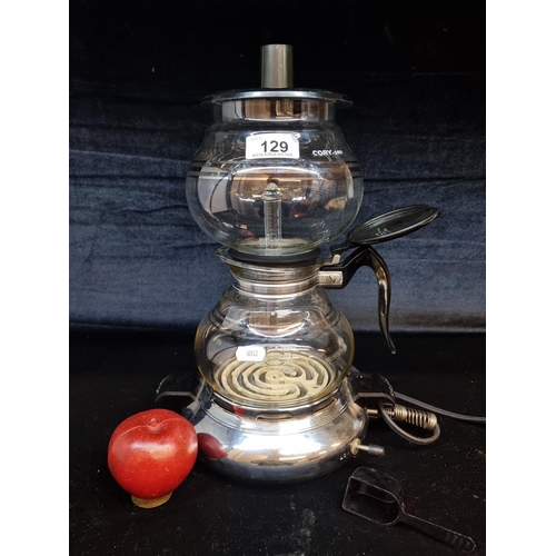 129 - A vintage Cory vacuum coffee brewer model DES. With two glass pots and burner to base. Internet comp... 