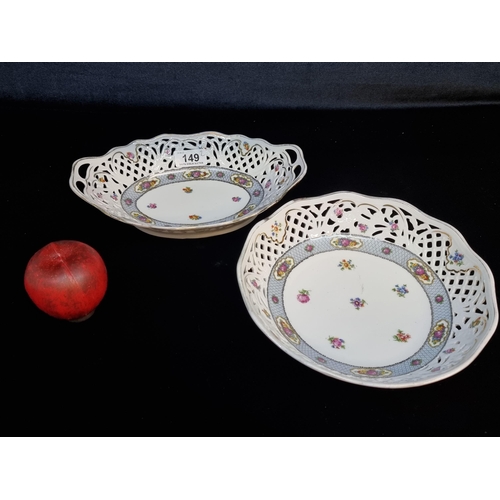 149 - Two  very pretty Dresden Bavarian centre bowls with lovely pierced detail and floral motif. Both in ... 