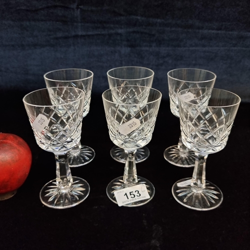 153 - A set of six stemmed crystal glasses in very good condition.