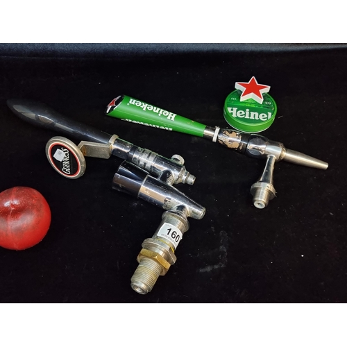 160 - A trio of breweriana items including a vintage Guinness stout tap with flow control. Along with a He... 