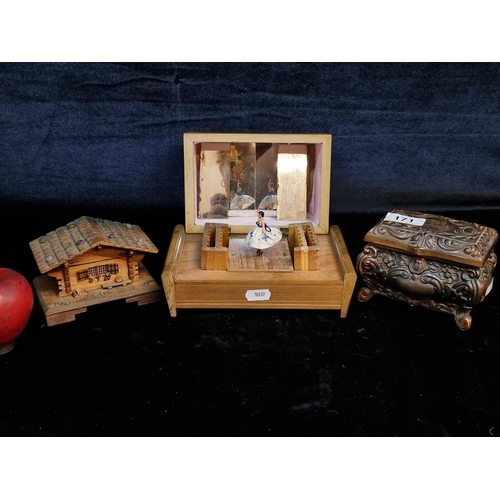 171 - Three vintage music boxes including copper example, another in a form of a cottage and another with ... 