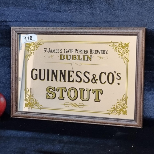 178 - A super vintage Guinness & Co. Stout advertising pub mirror. Housed in a wooden frame.