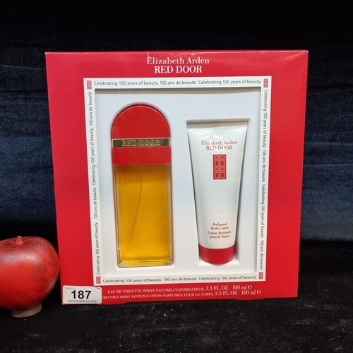 187 - An Elizabeth Arden Red Door beauty set comprising of an eau de toilette spray and body lotion. In or... 