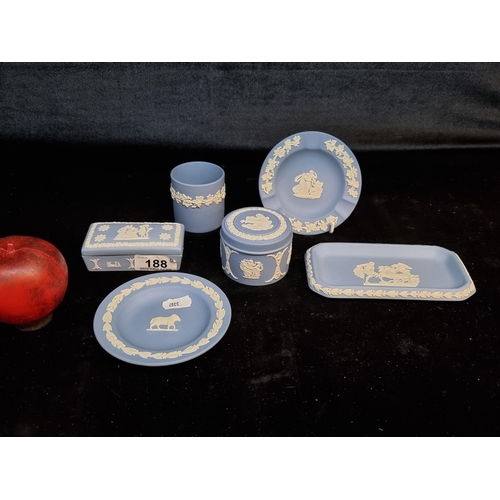 188 - Six pieces of Wedgwood Jasperware comprising of a plate, ashtray, ring dish, lidded jars and a cup.