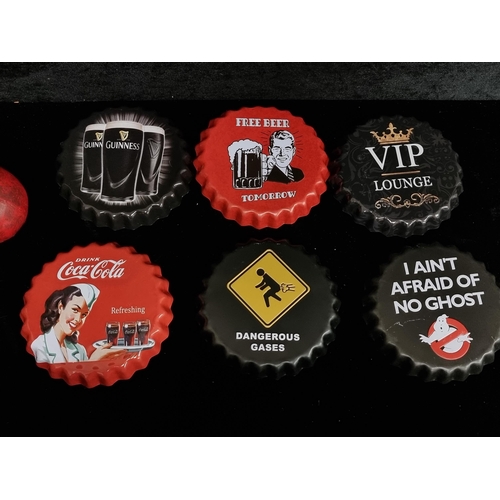 204 - A selection of six cast metal advertising wall plaques in the form of bottle caps. Including brands ... 