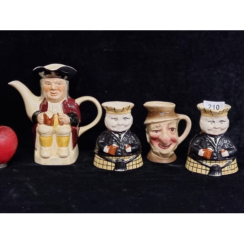 210 - A selection of four vintage Toby jugs including two Scot examples and a Tony Wood spouted example.