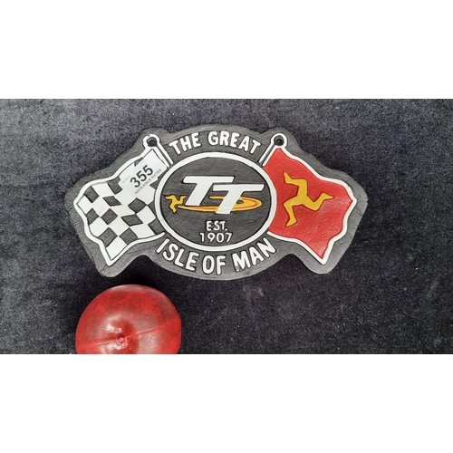 355 - A heavy cast metal plaque for the famous 