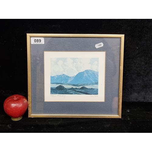 89 - A limited edition  print of a Paul Henry painting. (264/300) in pencil to base. Housed in a fine gil... 