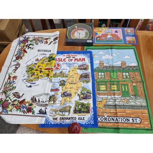 897 - Five items including a brand new The Simpsons cork backed tablemats and coasters set, a sealed Fanta... 