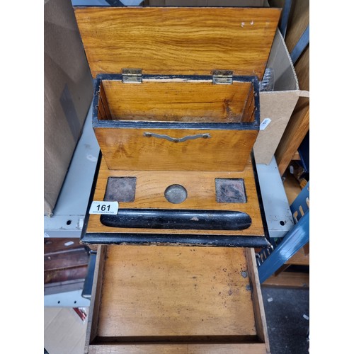 161 - A vintage wooden stationary box  with compartment to top, space for a pen and inkwells and a drawer ... 