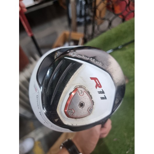 815 - A TaylorMade R11 golf driver on a Fujikura Blur shaft. This is a premium driver with adjustable loft... 