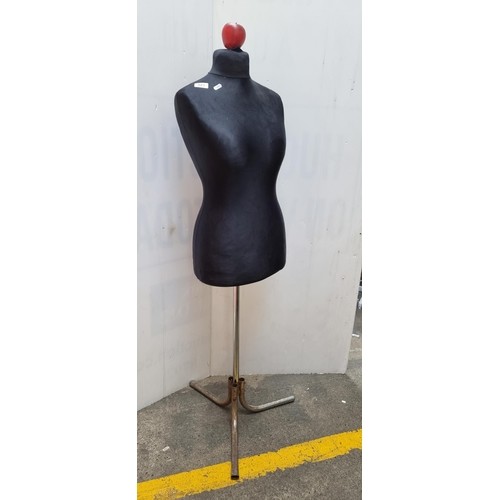 983 - A vintage female dressform / mannequin with black upholstered torso and a tubular metal base. H137cm