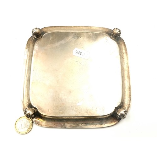 2 - A handsome example of a sterling silver raised tray, featuring a neat graduated step border and scro... 