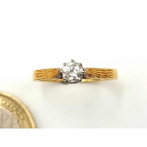 28 - Star Lot: A sparkling 18 carat gold Diamond Solitaire ring, featuring a fabulous central Diamond and... 