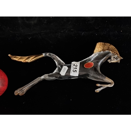 215 - A handblown vintage 1960s  Murano glass horse. A great whimsical example with gilt detail to mane, t... 