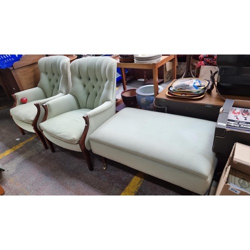 938 - Star Lot : Three items including a pair of button-back armchairs with wooden frames and removable cu... 