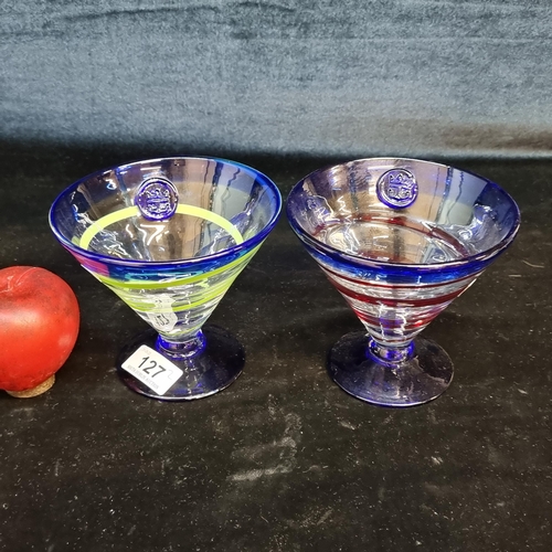 127 - A gorgeous set of two handblown art studio glass Kosta Soda Royal Caribbean martini glasses.