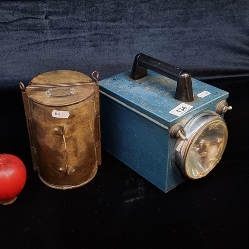 134 - A pair of vintage items including a large minors duolite handlamp in working condition with spare ba... 