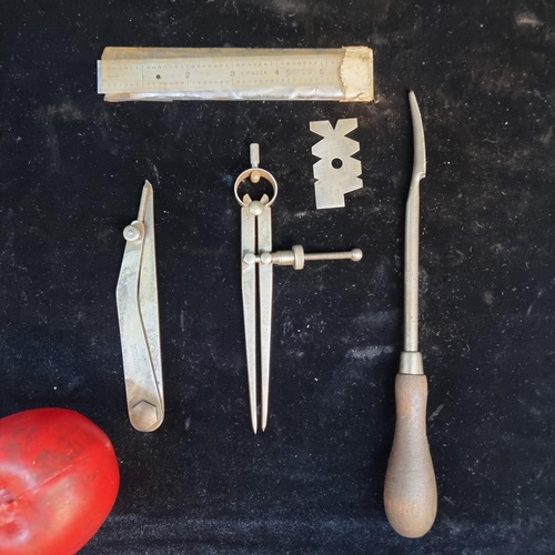 139 - A collection of five vintage engineers tools including a metal ruler and two compasses etc.