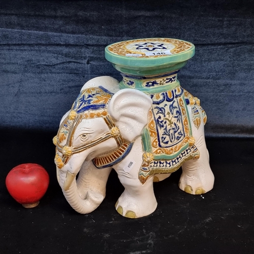 146 - A beautiful ceramic elephant plant stand.