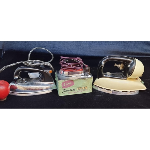 147 - Three vintage irons including a Clem traveling iron in original box, a Morphy Richards iron and a Ti... 