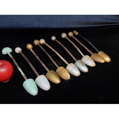 164 - Nine vintage shoe trees with metal and wooden elements.