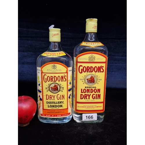 166 - Two sealed 1L bottles of Gordon's Dry Gin including a 1970s example with internet comps of €75 on es... 