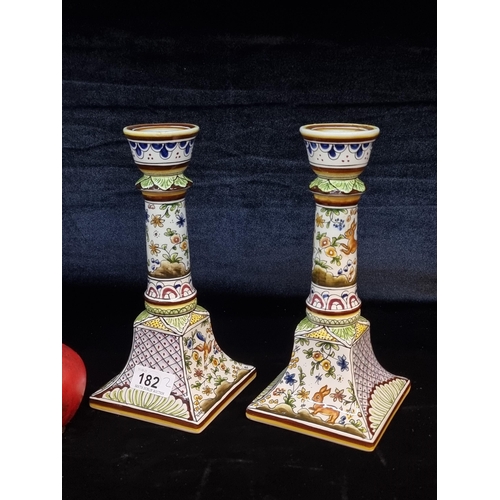 182 - A beautiful pair of Portuguese handpainted candle holders from the city of Coimbra. Featuring wonder... 