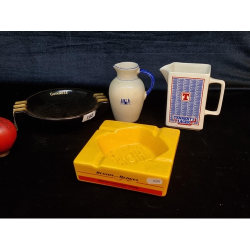 188 - A Guinness Arklow Pottery ashtray, a Benson and Hedges ashtray from Wade and a Tennent's Lager whisk... 