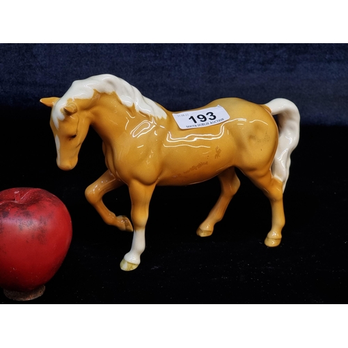 193 - A rare Beswick porcelain figure of a Palomino horse. With mark to base and in very good condition.