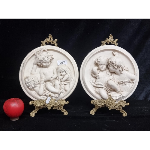 207 - Star Lot : A fabulous pair of beautiful plaster wall plaques with scenes of cherubs in high relief w... 