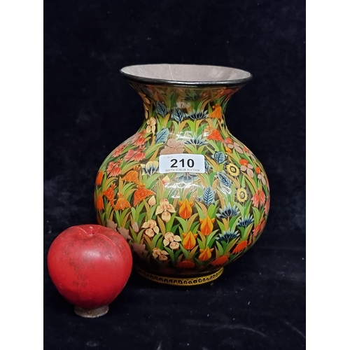 210 - A very attractive paper mache vase by H.M Sadiq with hand painted scenes of flowers.