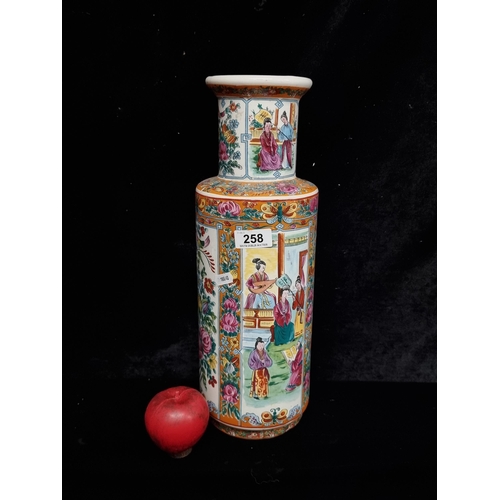 258 - A large ceramic Chinese vase featuring court scenes and flora designs. In very good condition. H42cm